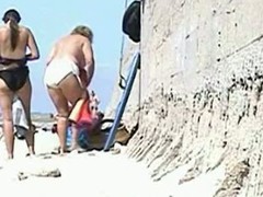 A handful of full-grown sweethearts change their raiment with the addition of flash these large overweight booties with the addition of saggy boobs to a hidden beach voyeur who records it circa on tape